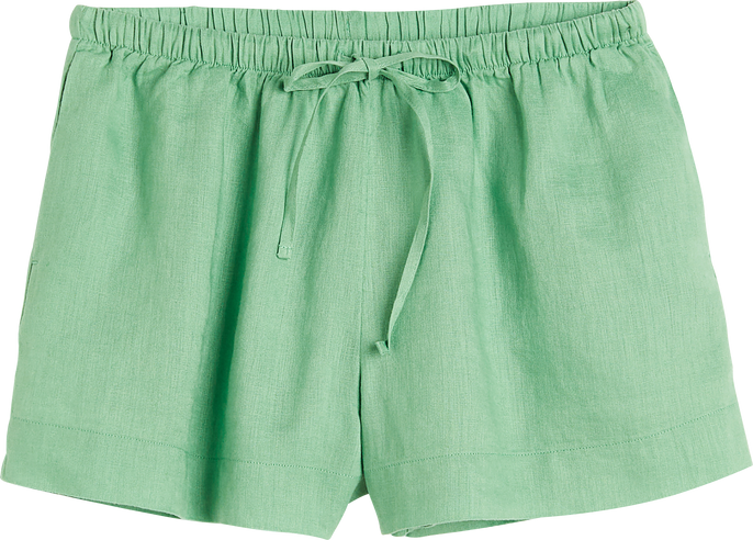 Front view of isolated green linen woman short